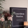 Coffee Table Fotoalbum Unwritten Stories - 40 bilder i 10x15 cm